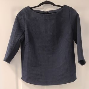 Club Monaco Navy colored textured Top with open back